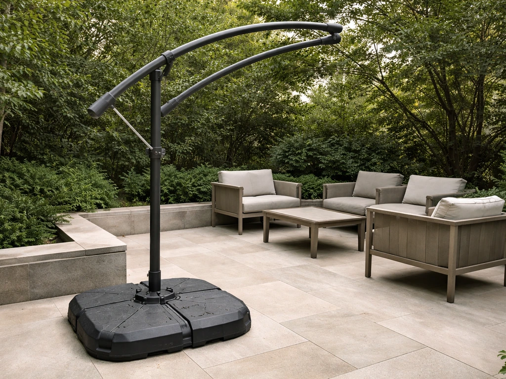 Vienna cantilever umbrella base filled with sand, arm extended over seating area during setup.